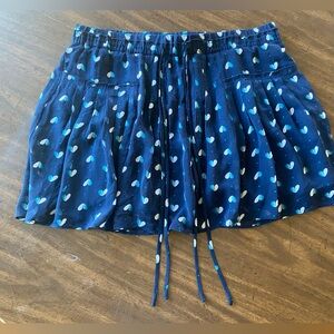 American Eagle navy mini skirt with heart pattern